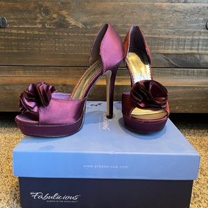 Purple high heel shoes.
